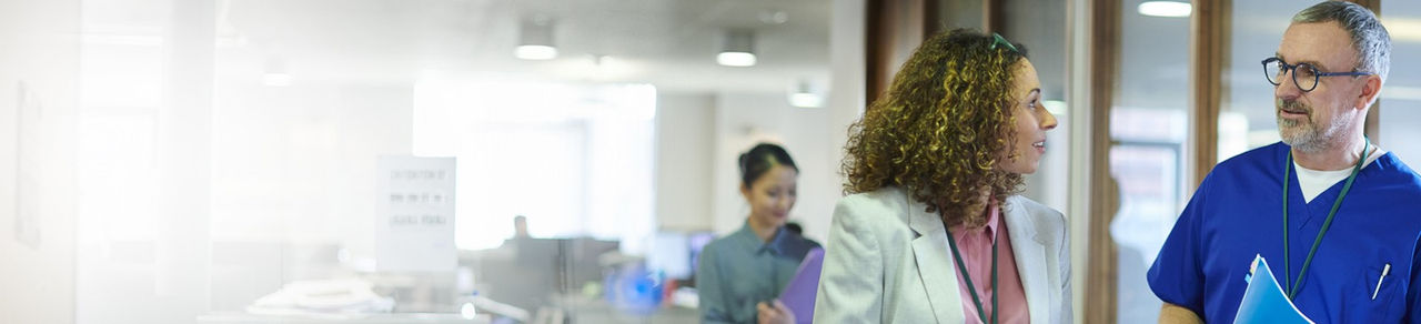 Two medical professional doing conversation inside hospital